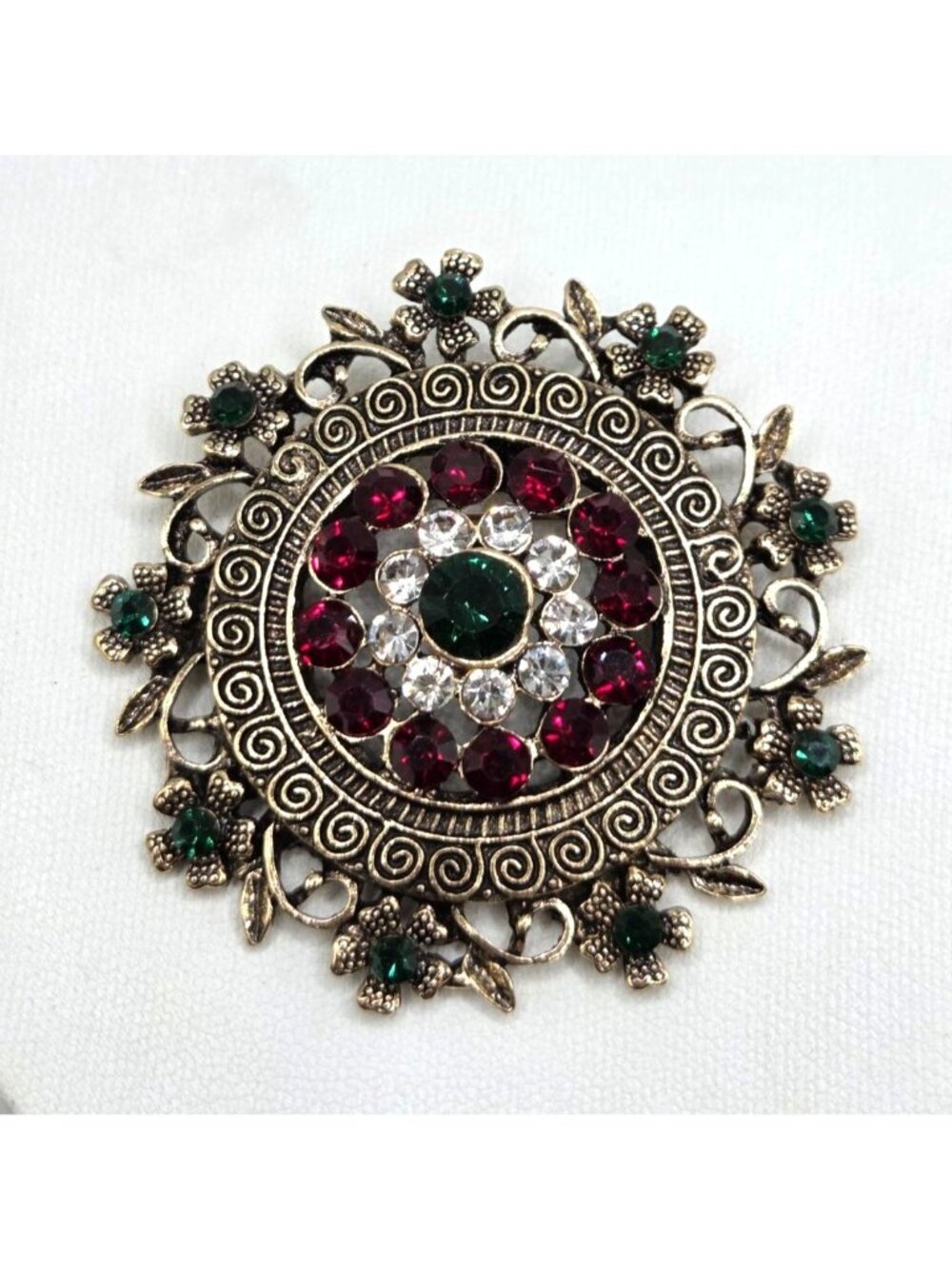 Gold-Tone Brooch With Red Green & Clear Rhinestones In Floral Filigree Design